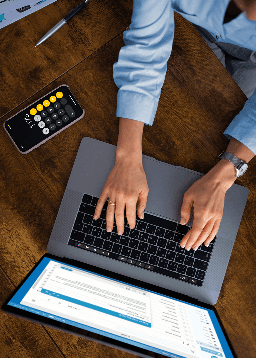 view-woman-typing-laptop.png
